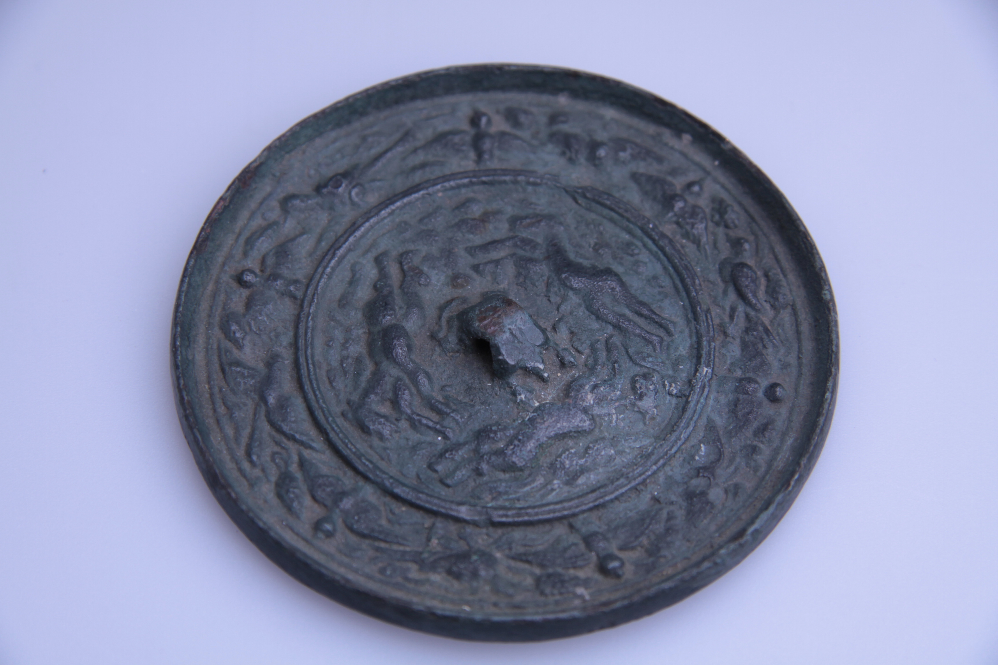 金奔马瑞鸟纹铜镜 金奔马瑞鸟纹铜镜.jpg