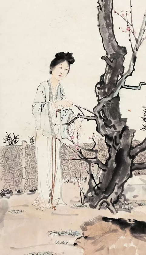 清秀的古装仕女立于树下 清秀的古装仕女立于树下.jpg